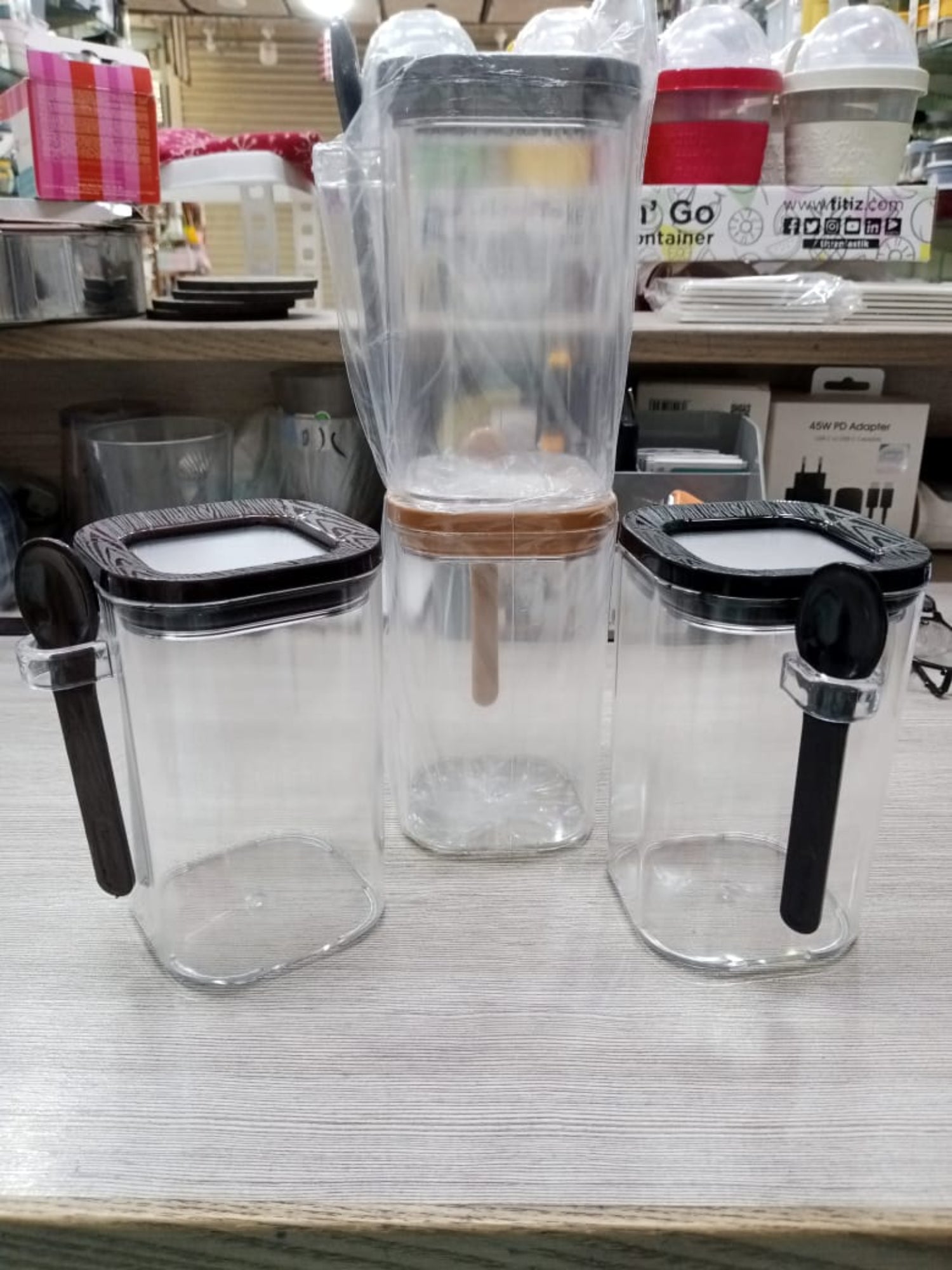 Zidello Acrylic Airtight Jar with Spoon – A durable, leak-proof storage jar designed for spices, sugar, and other kitchen essentials. Featuring an airtight seal and a built-in spoon, it ensures freshness and easy access while keeping contents secure.